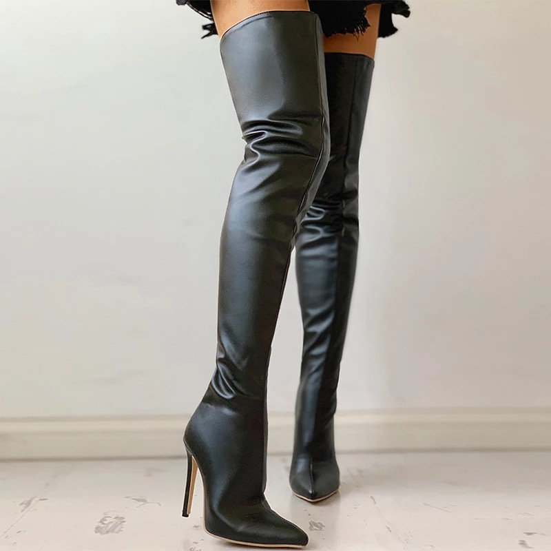 Black overknee boots worn with high heels side view