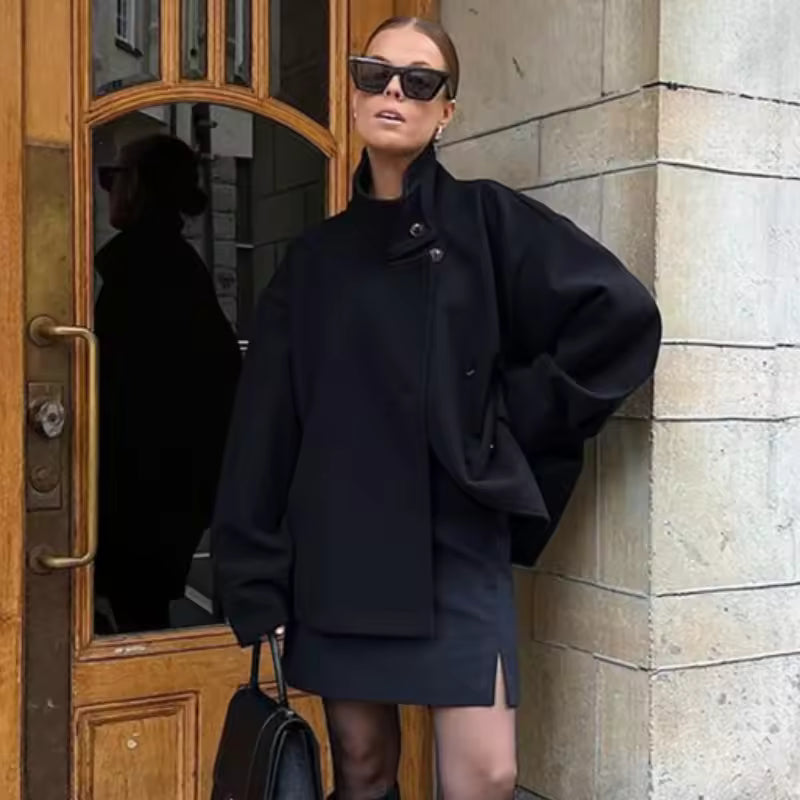 Damesjas zwart met hoge kraag en bolmouwen front view