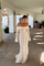 Luxe kanten maxi-jurk wit off-shoulder vooruitschot