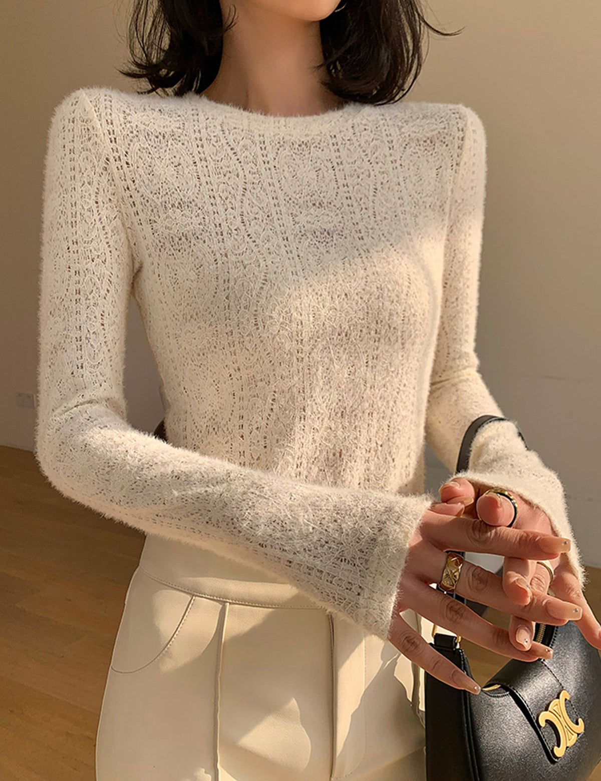 Cream knit top with openwork pattern front view