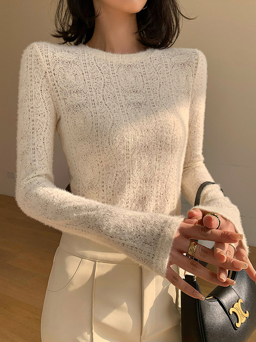 Cream knit top with openwork pattern front view