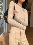 Cream knit top with openwork pattern side view