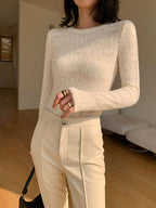 Cream knit top with openwork pattern front detail