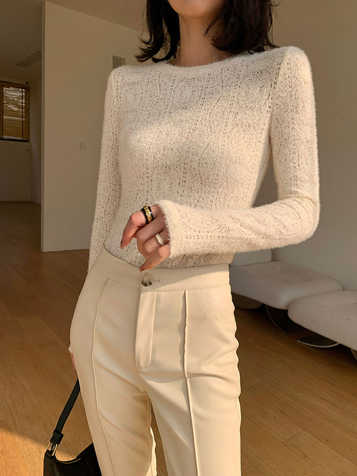 Cream knit top with openwork pattern front detail