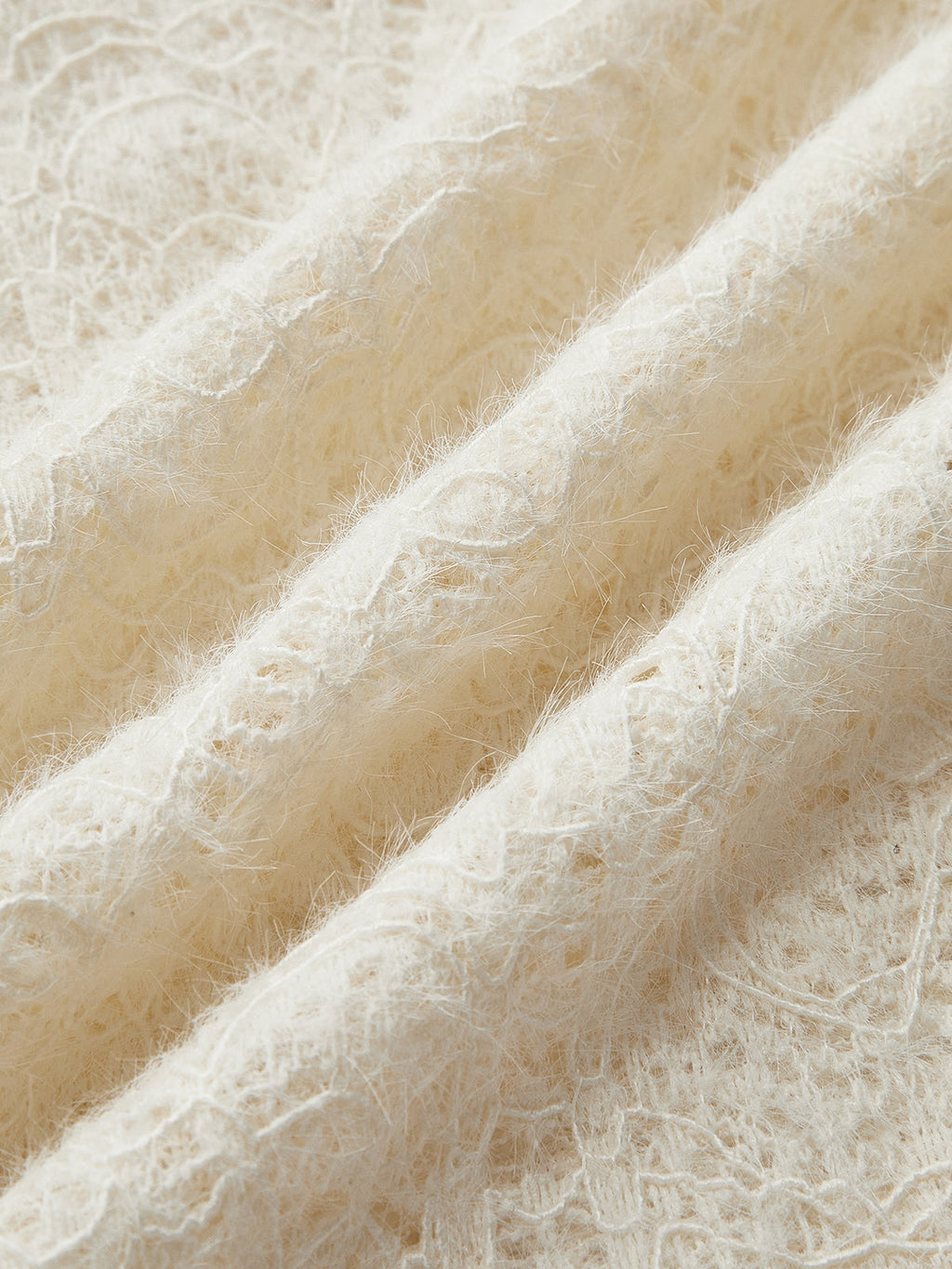 Cream knit top with openwork pattern fabric detail