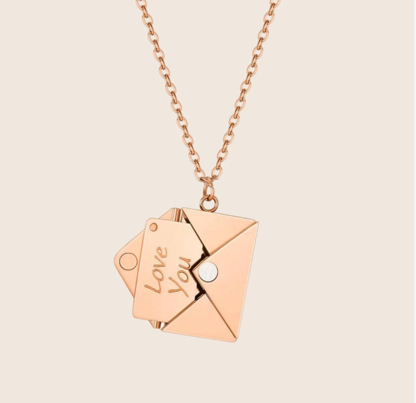 Rose gold envelope locket necklace front view with 'Love You' tag