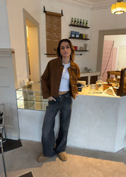 Cropped silhouette jacket brown front view with hands in pockets