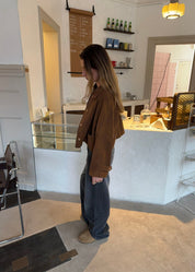 Cropped silhouette jacket brown back view