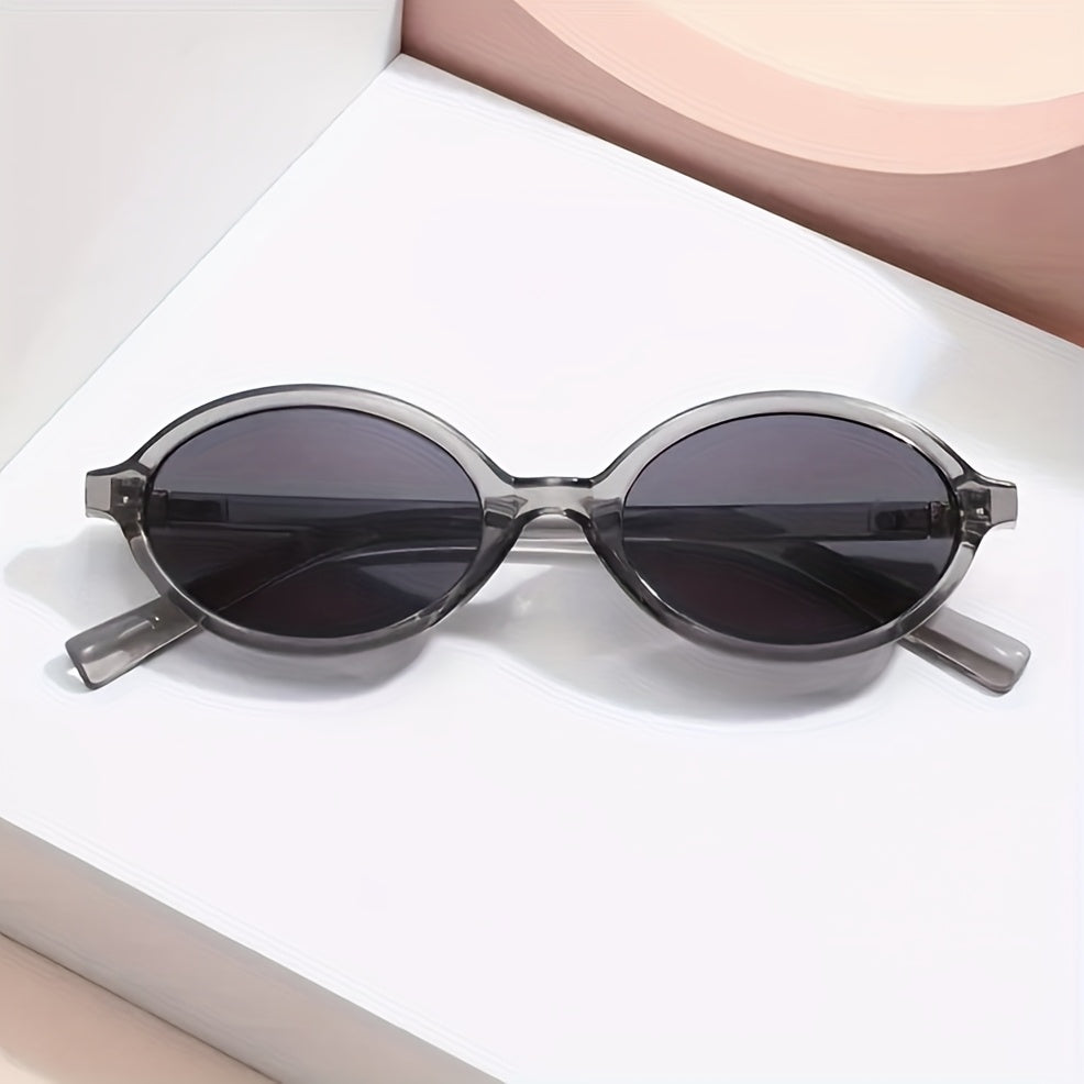 Sunglasses, retro oval frame, translucent gray plastic, front view