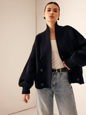 Black chunky knit cardigan with high collar and belt