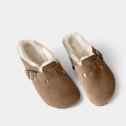 Beige suede clogs with fur lining side view