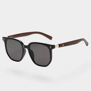Sunglasses with brown wooden arms and black frames front view