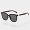 Sunglasses with brown wooden arms and black frames front view