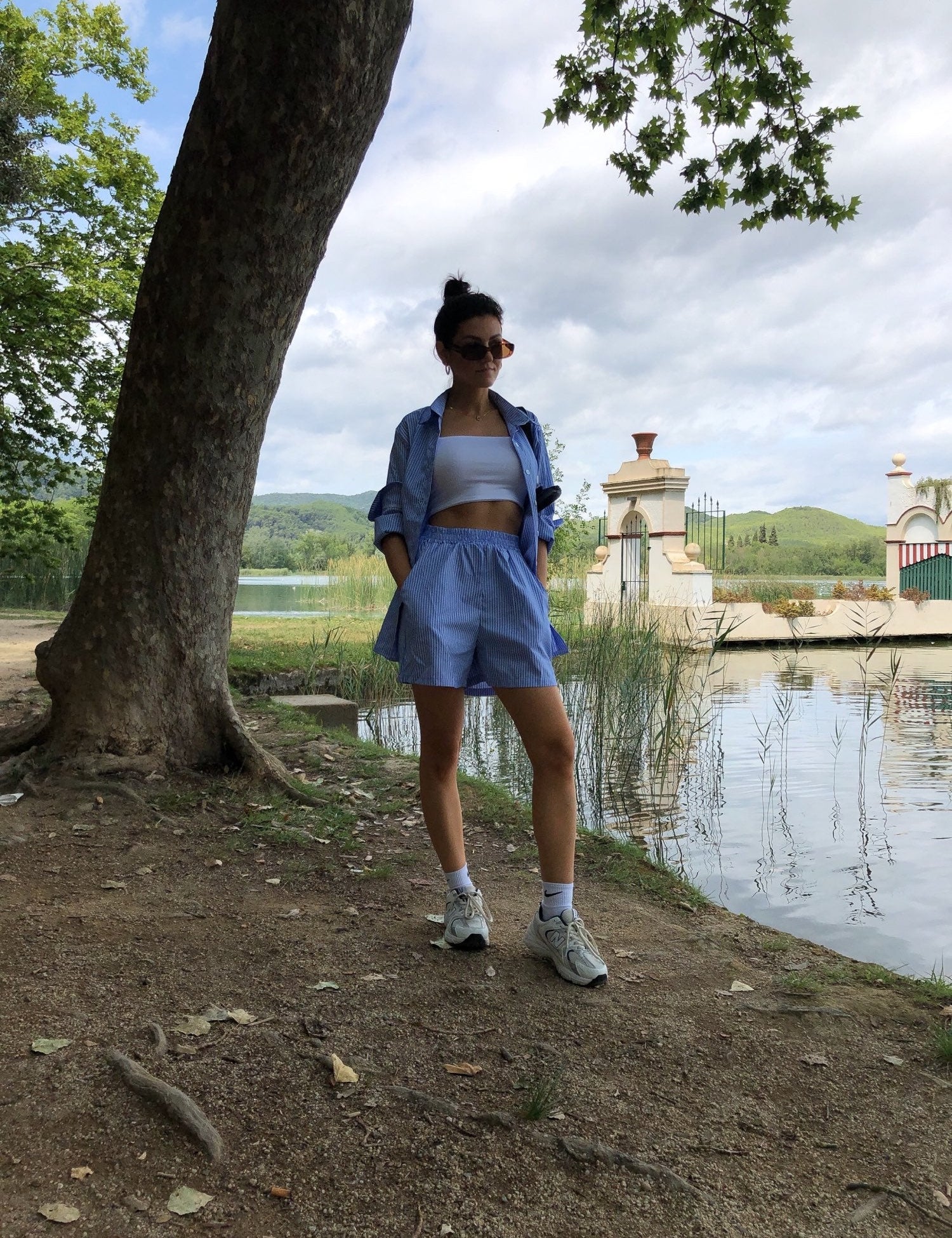 Blue striped shirt and shorts set outdoor side view