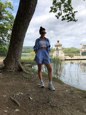 Blue striped shirt and shorts set outdoor side view