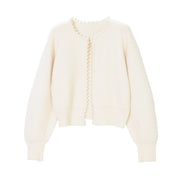 Cream cardigan with pearl trim detailing, front view