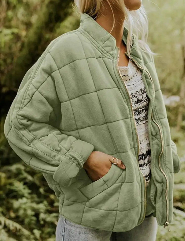 Jas met blokpatroon groen zijprofiel