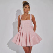 Mini jurk roze met pailletten, hoge taille, front view