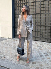 Tweed suit beige front view with black bag and beige heels