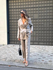 Tweed suit beige front view with black bag and beige heels