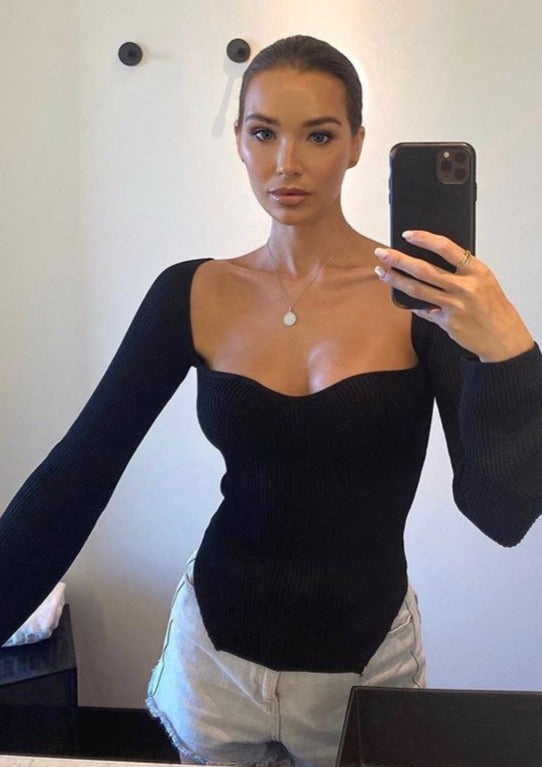 Black ribbed bodysuit selfie front view with white shorts