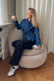 Denim jacket with tie front detail worn with jeans and sneakers
