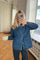 Denim jacket with tie front detail worn with jeans