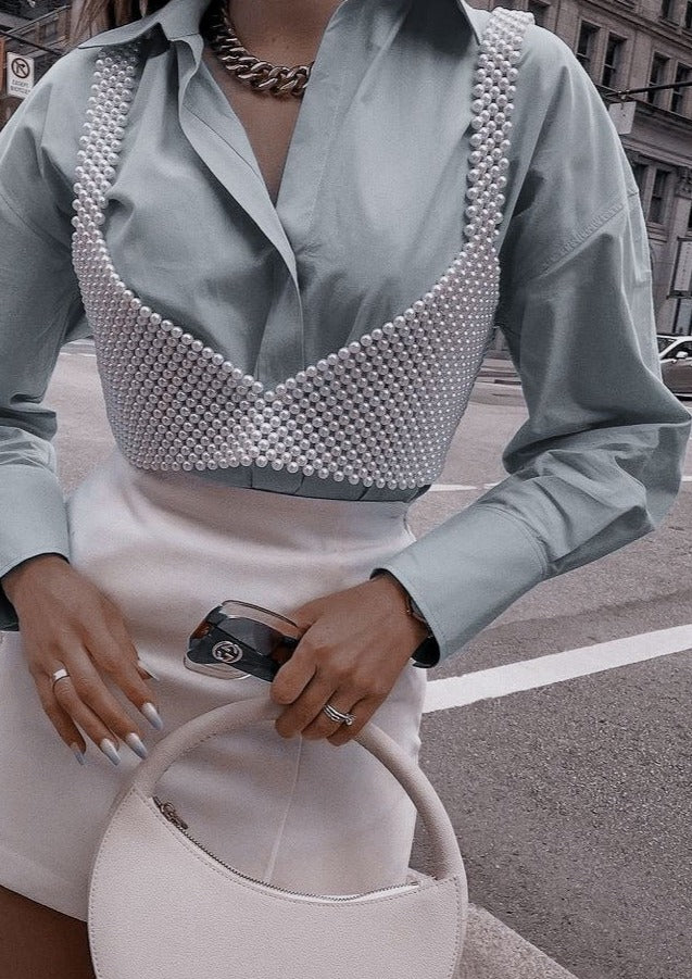 Bralette with woven pearl grid detail worn with blazer and shorts street style view