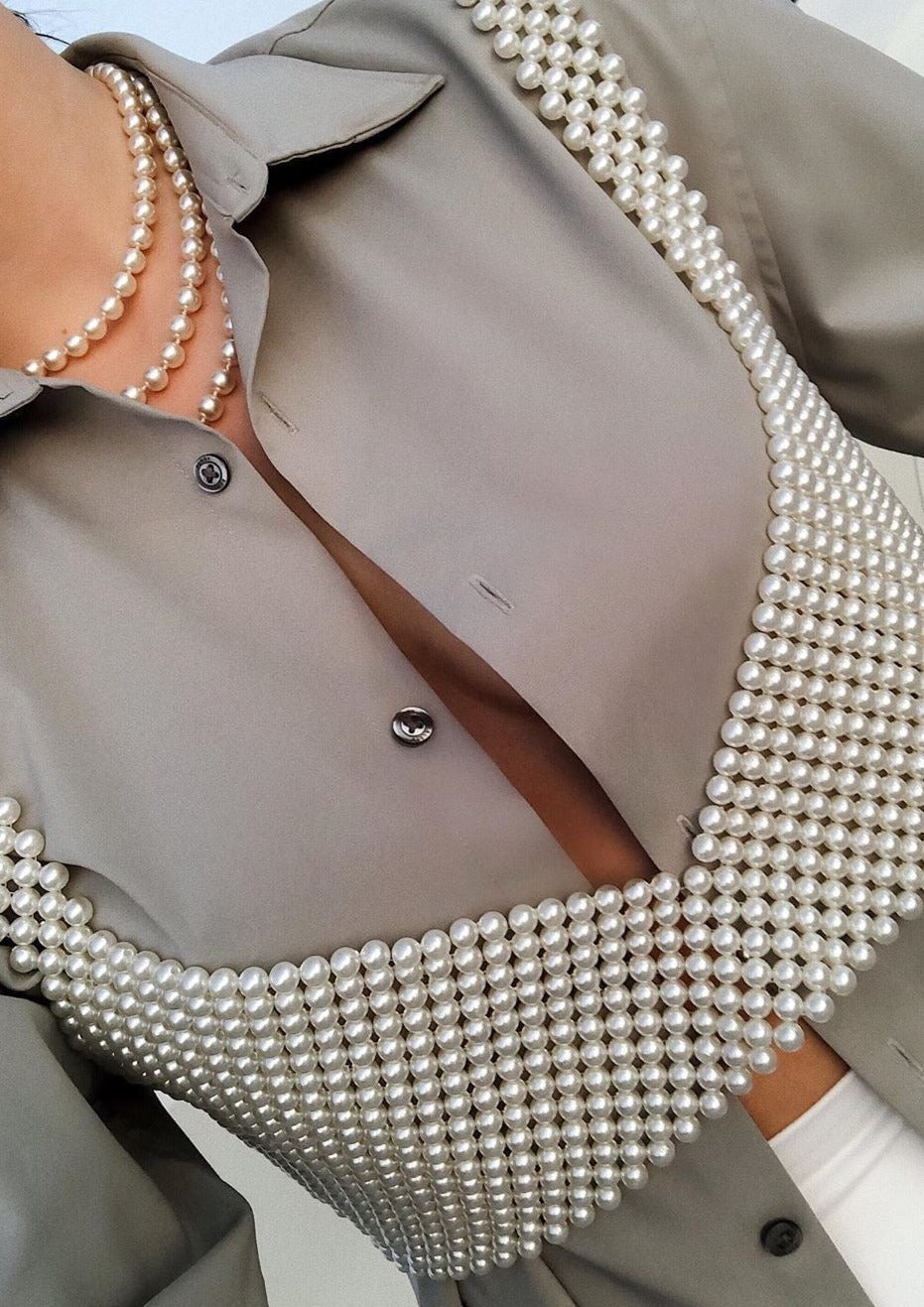 Pearl grid bralette worn under blazer front view