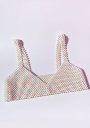 Synthetic pearl bralette close-up side view