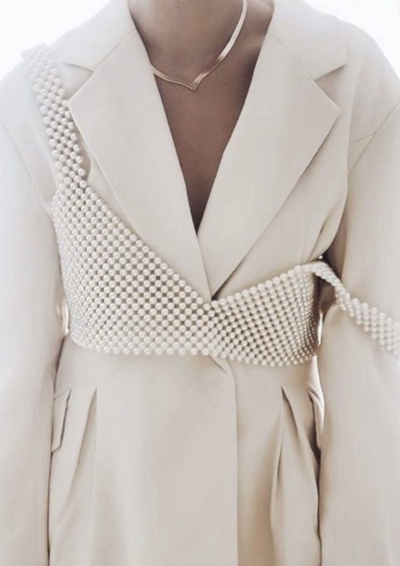 Pearl grid bralette worn under white blazer front view