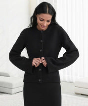 Knit vest black with bell sleeves and black buttons front view