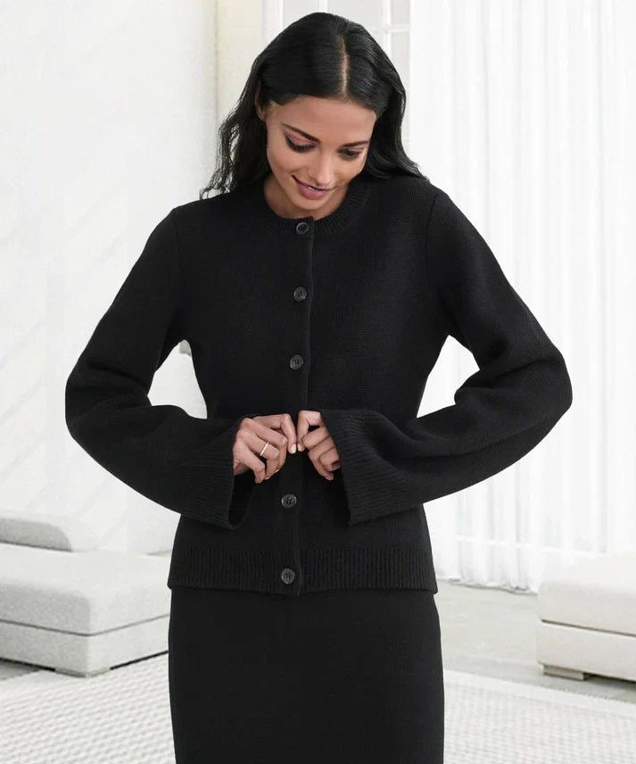 Knit vest black with bell sleeves and black buttons front view