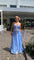 Blue ruffled two-piece set outdoor view