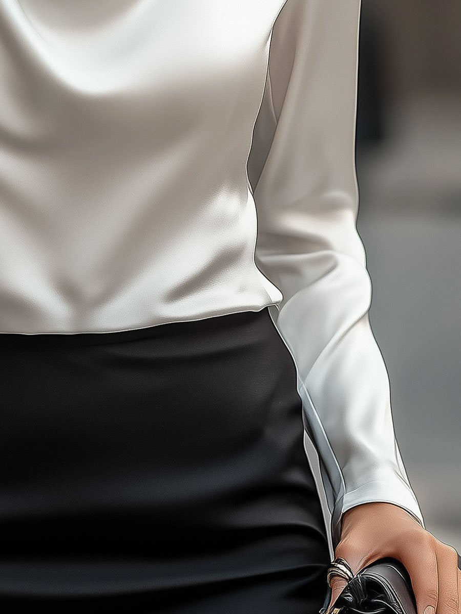 Witte satijnen blouse met watervalhals detail shot