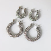 Silver hoop earrings with pave crystals angled view