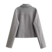 Gray jacket back view with gold buttons
