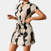 Abstract print dress black and beige front view