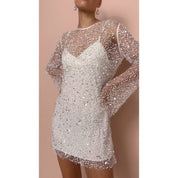 Mini dress with sequin embellishments and mesh sleeves side profile