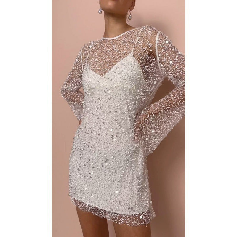 Mini dress with sequin embellishments and mesh sleeves side profile