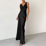 Black maxi dress with draped neckline side view
