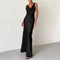 Black maxi dress with draped neckline side view