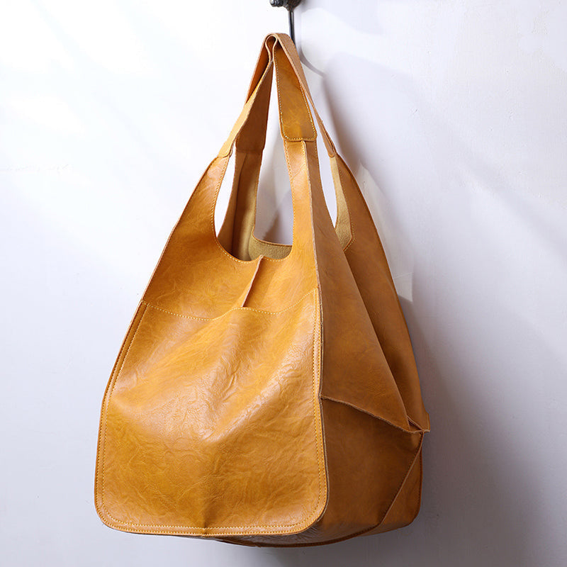 Valerie Oversized schoudertas in vintage leer met ruime draagcapaciteit