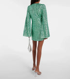 Mini jurk met glitter en wijde mouwen groen achterzijde