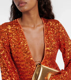 Mini jurk met glitter oranje met V-hals en wijde mouwen close-up