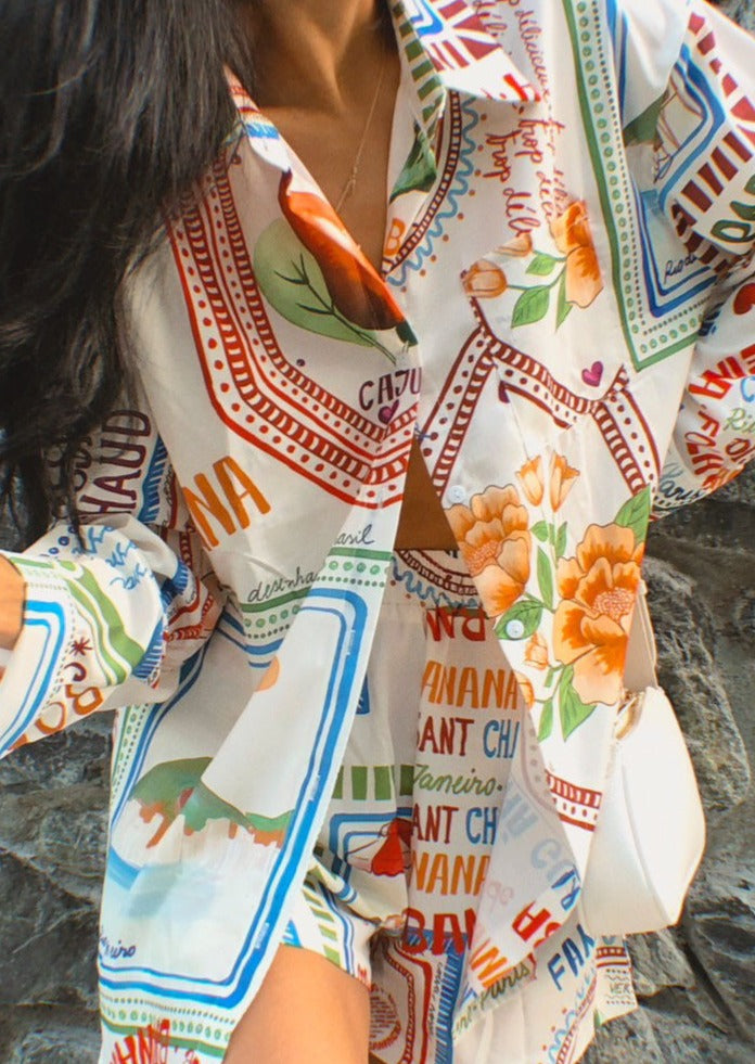 Two-piece set with vibrant botanical design, upper body detail