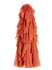 Orange maxi dress with ruffles, studio front view on mannequin