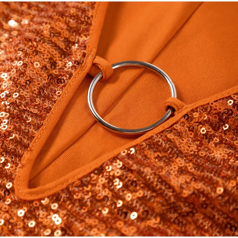 Mini jurk oranje met glitter en metalen ring detail