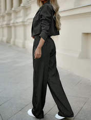 Black striped blazer and pants set side profile