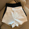 High-waisted shorts white front view